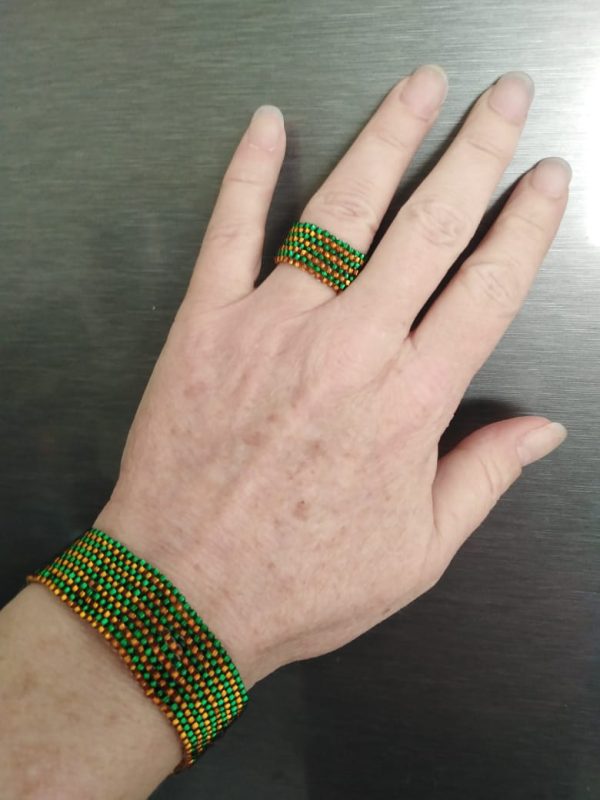 Brachelet Set Green Model A handcrafted beaded gold and green bracelet and ring set featuring Czech glass beads. The ring circumference is about 7cm and bracelet length is about 18cm.