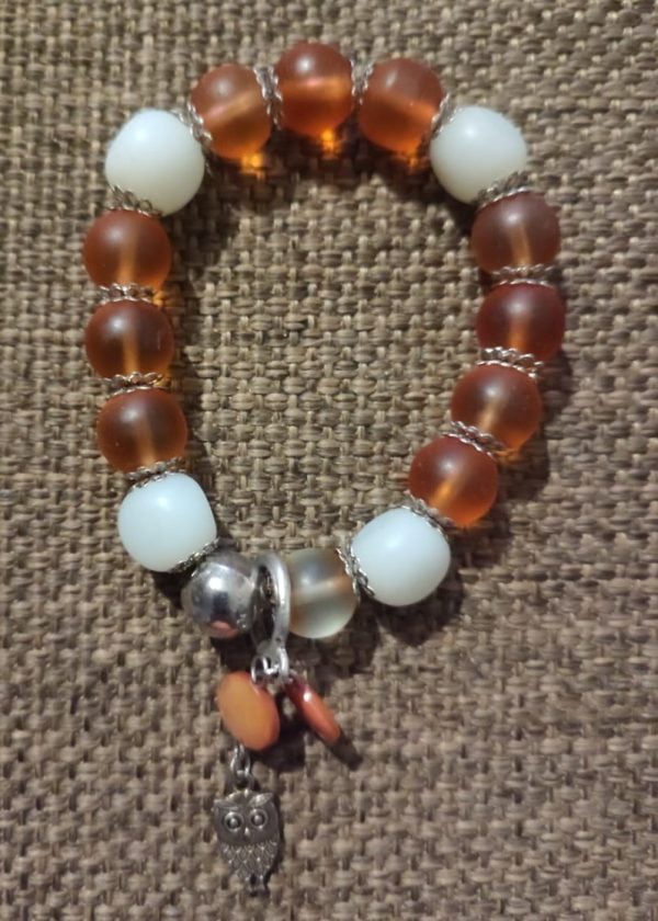 Brown Wired Bracelet Set1 Brown Memory Wire Bracelet Set - Handcrafted by RSart in South Africa, featuring brown and white beads, silver caps, charms, rock beads, crystal beads, and painted heart-shaped beads.