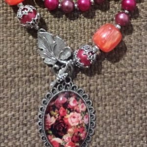 Flower Necklace Set - Handcrafted by RSart in South Africa, featuring maroon and cherry pink glass beads, silver accents, cylinder orange marble beads, flower pendant, and crystal slider bracelet detail.