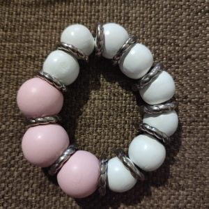 Soft Pink Wooden Bracelet Set - Handcrafted jewelry featuring medium white and larger pink wooden beads with silver dividers, accompanied by matching floral earrings in pink and white beads.