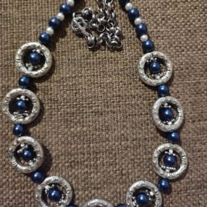 Silver Loop Dark Royal Blue Necklace Set - Handcrafted jewelry ensemble with dark royal blue pearl beads, silver rings, sliders, and small white glass beads.