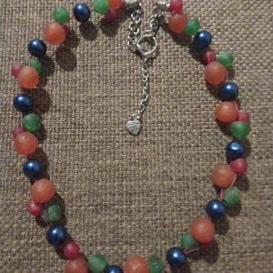 Colorful Rainbow Rock Necklace Set with orange, green, and red rock beads, midnight blue glass beads, silver sliders, elasticated bracelet, and matching earrings by RSart in South Africa.