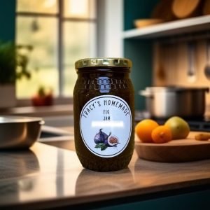 fb1c019609d8428f85412b1660f40966~tplv-tnf8g33v4j-image A glass jar filled with classic caramel coloured jam. A label reads "Tracy's Homemade Fig Jam, South Africa".