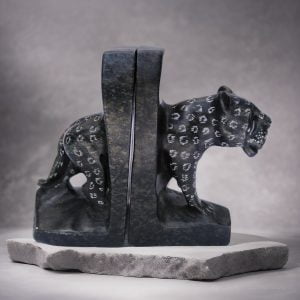 Handcrafted Leopard Stone Bookends - Unique handcrafted leopard bookends made from stone, approximately 15cm high and 20cm long.