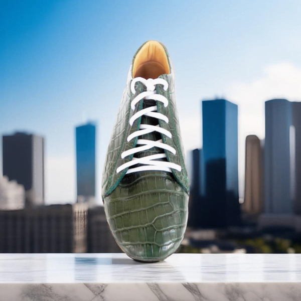 Page 1 Elevate your style with the Emerald Crocodile Sneaker, a handcrafted unisex footwear masterpiece featuring genuine crocodile leather, double-padded interiors, and a durable rubber sole. Available in a wide range of colors with white or black sole options.