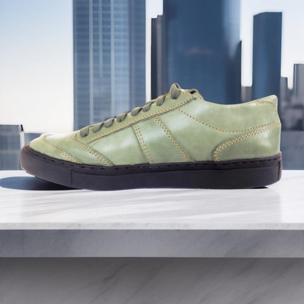 Page 2 Step into style and comfort with our Track Leather Sneaker, a premium unisex design handcrafted from genuine cowhide. Available in buffalo and calf leather