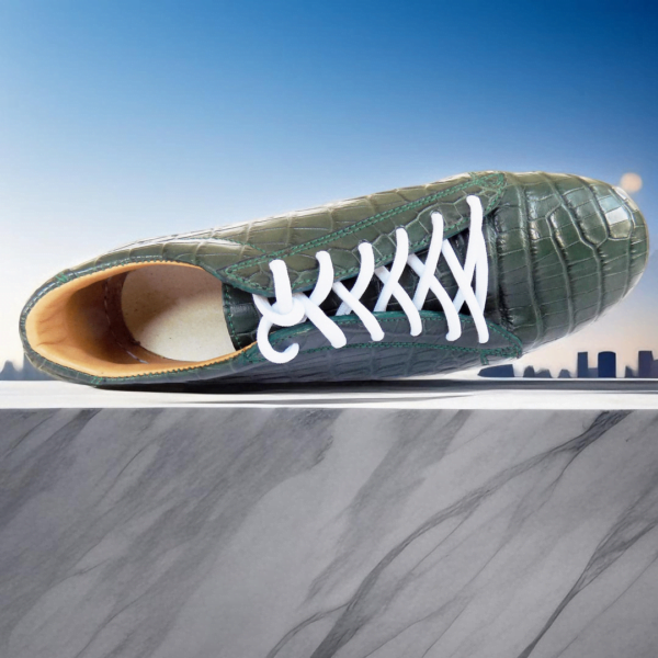 Page 2 Elevate your style with the Emerald Crocodile Sneaker, a handcrafted unisex footwear masterpiece featuring genuine crocodile leather, double-padded interiors, and a durable rubber sole. Available in a wide range of colors with white or black sole options.