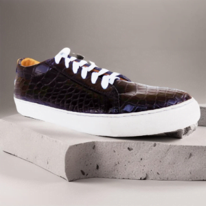 Elevate your footwear collection with our Handmade Ostrich Leather Sneaker - Yara Collection, crafted from genuine ostrich leather. Featuring a hand-stitched rubber sole and a double-padded genuine leather with foam interior, it offers both style and comfort. Available in a variety of colors and also in crocodile leather.