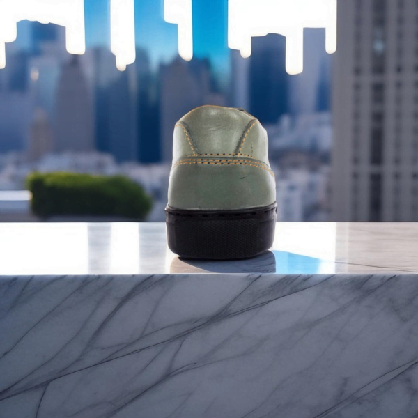 Page 3 Step into style and comfort with our Track Leather Sneaker, a premium unisex design handcrafted from genuine cowhide. Available in buffalo and calf leather