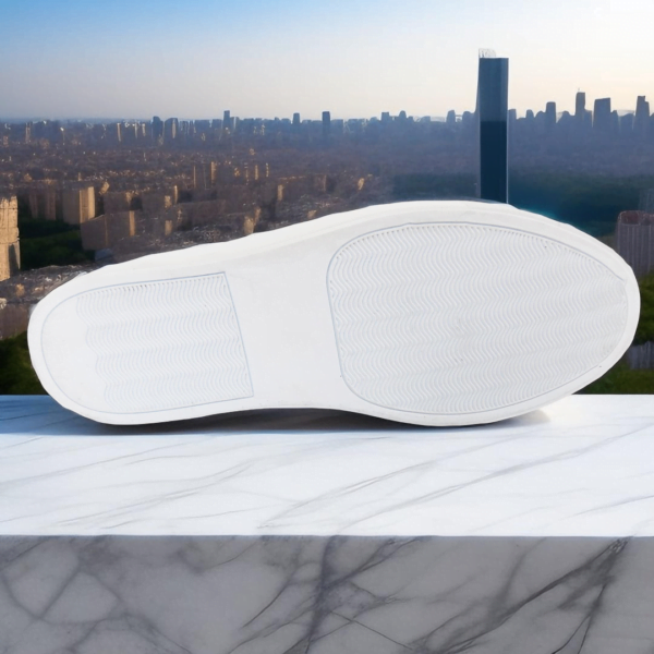 Page 3 Elevate your style with the Emerald Crocodile Sneaker, a handcrafted unisex footwear masterpiece featuring genuine crocodile leather, double-padded interiors, and a durable rubber sole. Available in a wide range of colors with white or black sole options.