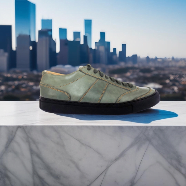 Page 4 Step into style and comfort with our Track Leather Sneaker, a premium unisex design handcrafted from genuine cowhide. Available in buffalo and calf leather