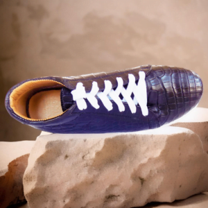 Elevate your footwear collection with our Handmade Ostrich Leather Sneaker - Yara Collection, crafted from genuine ostrich leather. Featuring a hand-stitched rubber sole and a double-padded genuine leather with foam interior, it offers both style and comfort. Available in a variety of colors and also in crocodile leather.